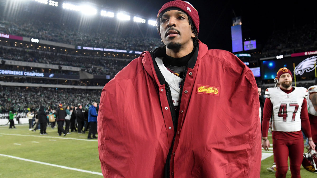 Washington Commanders quarterback Jayden Daniels (5) walks off the field after losing the NFC Championship game against the Philadelphia Eagles at Lincoln Financial Field.