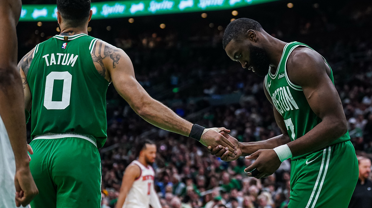 Boston Celtics guard Jaylen Brown (7) reacts after missing a pass from Boston Celtics forward Jayson Tatum (0) against the New York Knicks in the second half during game two of the second round for the 2025 NBA Playoffs at TD Garden.