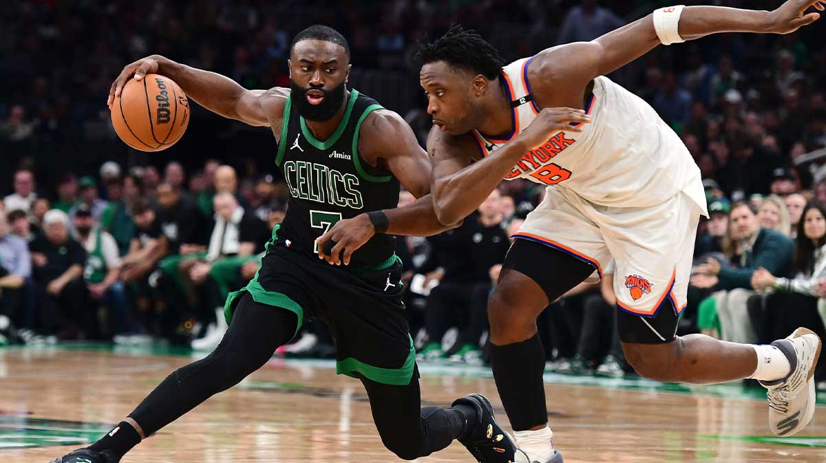 Boston Celtics guard Jaylen Brown (7) controls the ball from New York Knicks forward OG Anunoby (8) in the second half during game five of the second round for the 2025 NBA Playoffs at TD Garden.
