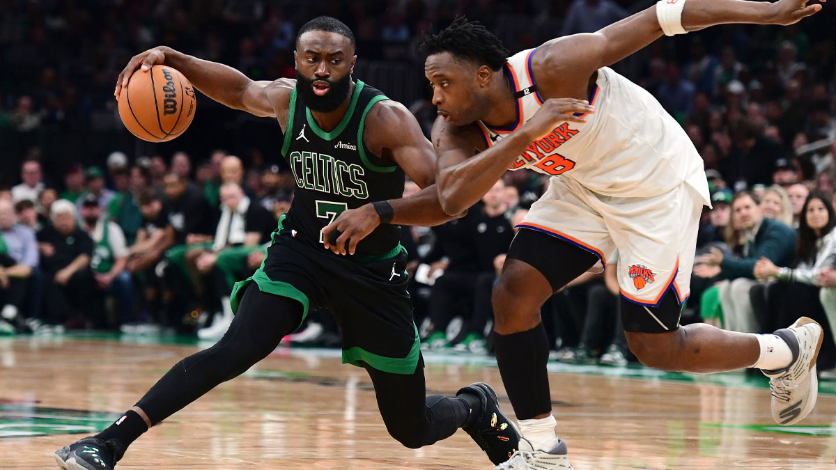 Boston Celtics guard Jaylen Brown (7) controls the ball from New York Knicks forward OG Anunoby (8) in the second half during game five of the second round for the 2025 NBA Playoffs at TD Garden.