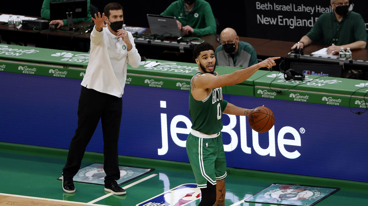 Boston Celtics forward Jayson Tatum (0) and head coach Brad Stevens direct players during the fourth quarter against the New York Knicks at TD Garden.