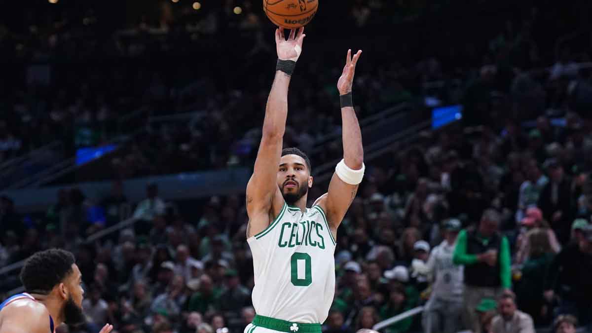 Boston Celtics forward Jayson Tatum (0) shoots the ball against the New York Knicks in the third quarter during game one of the second round for the 2025 NBA Playoffs at TD Garden.