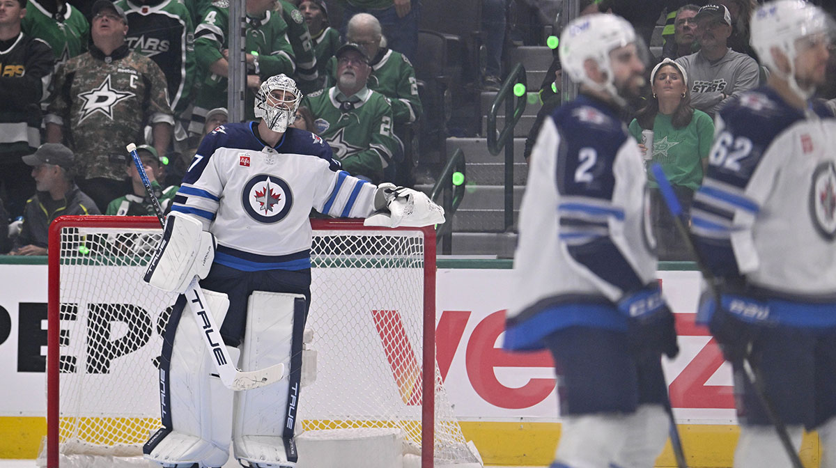 Winnipeg Jets goaltender Connor Hellebuyck (37) looks on after allowing a goal to Dallas Stars defenseman Alexander Petrovic (not pictured) during the third period in game three of the second round of the 2025 Stanley Cup Playoffs at American Airlines Center.