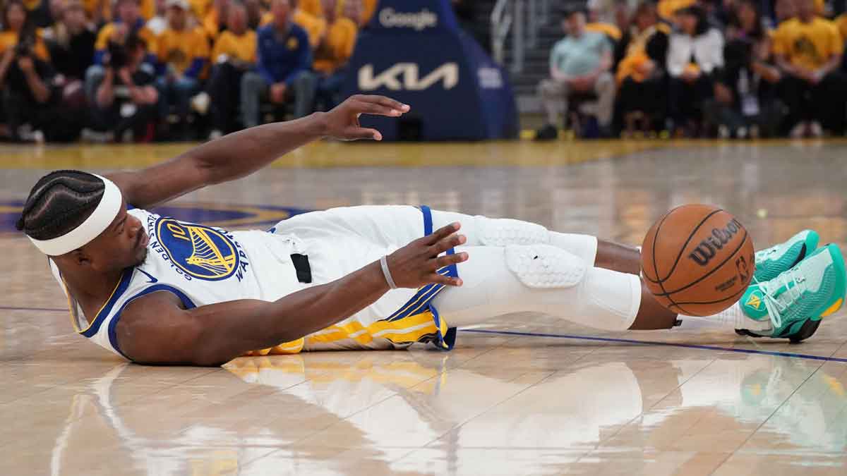 Golden State Warriors forward Jimmy Butler III (10) falls to the ground after being fouled in the second quarter against the Minnesota Timberwolves during game three in the second round of the 2025 NBA Playoffs at Chase Center.