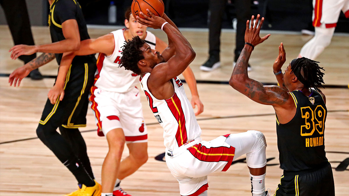 Miami Heat forward Jimmy Butler (22) shoots the ball against Los Angeles Lakers center Dwight Howard (39) during the first quarter in game two of the 2020 NBA Finals at AdventHealth Arena.