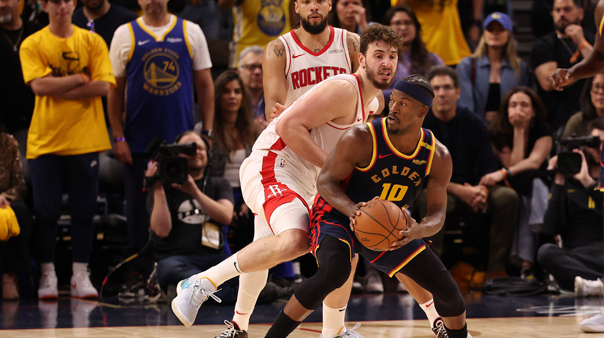 Golden State Warriors forward Jimmy Butler III (10) controls the ball below Houston Rockets center Alperen Sengun (28) during the fourth quarter of game four of the 2025 NBA Playoffs first round at Chase Center.