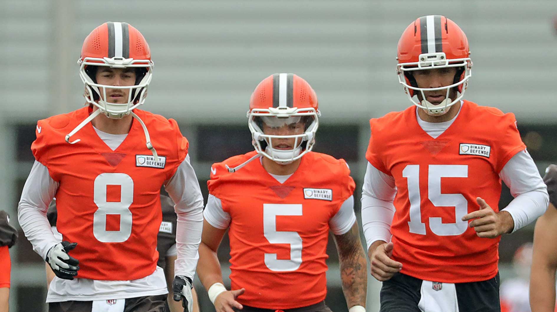 Cleveland Browns quarterbacks Kenny Pickett, left, Dillon Gabriel, center, and Joe Flacco warm up during an NFL practice at the Cleveland Browns training facility on Wednesday, May 28, 2025, in Berea, Ohio.