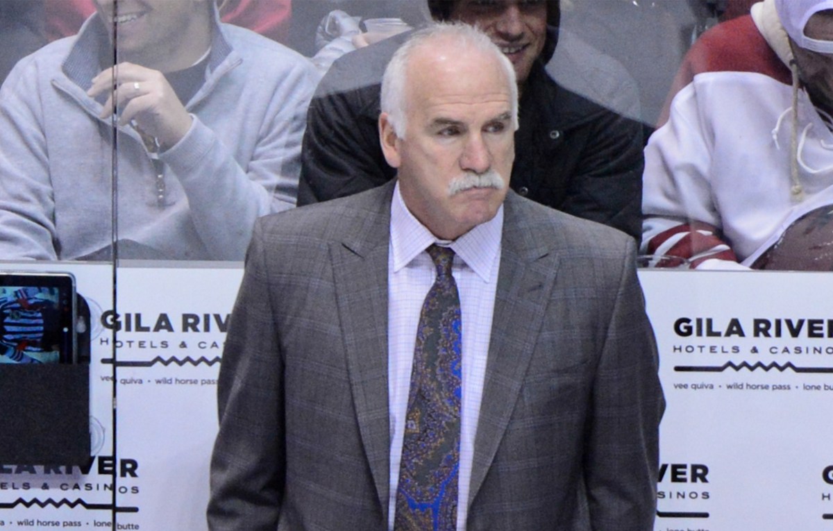 Chicago Blackhawks head coach Joel Quenneville looks on during the first period against the Arizona Coyotes at Gila River Arena.