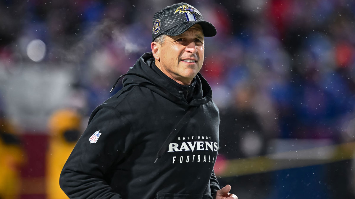 Baltimore Ravens head coach John Harbaugh enters the field before a 2025 AFC divisional round game against the Buffalo Bills at Highmark Stadium.