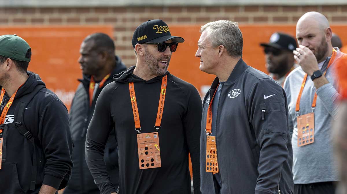 Washington Commanders general manger Adam Peters reunites with former boss John Lynch during Senior Bowl practice for the American team at Hancock Whitney Stadium. Lynch is the general manager of the San Francisco 49ers.