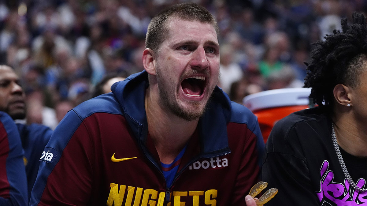 Denver Nuggets center Nikola Jokic (15) reacts from the bench in the third quarter against the LA Clippers during game seven of first round for the 2025 NBA Playoffs at Ball Arena.