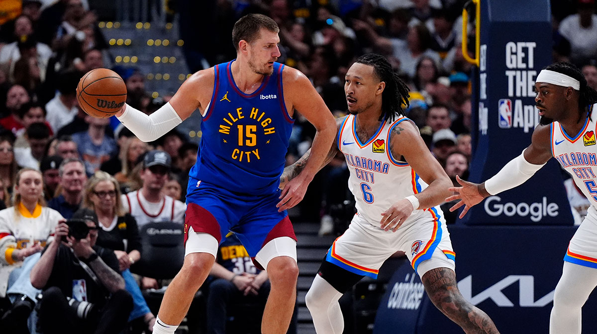 Oklahoma City Thunder forward Jaylin Williams (6) defends on Denver Nuggets center Nikola Jokic (15) in the first half during game three of the second round for the 2025 NBA Playoffs at Ball Arena.