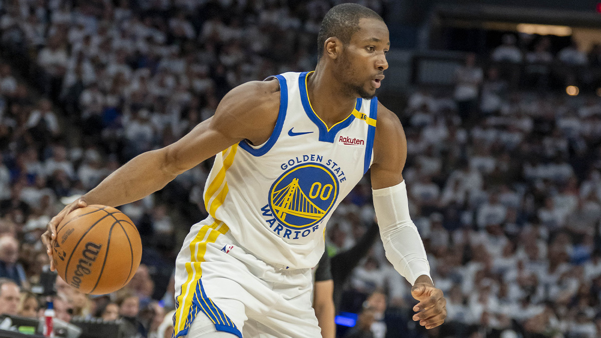 Golden State Warriors forward Jonathan Kuminga (00) dribbles the ball against the Minnesota Timberwolves in the second half during game two of the second round for the 2025 NBA Playoffs at Target Center.