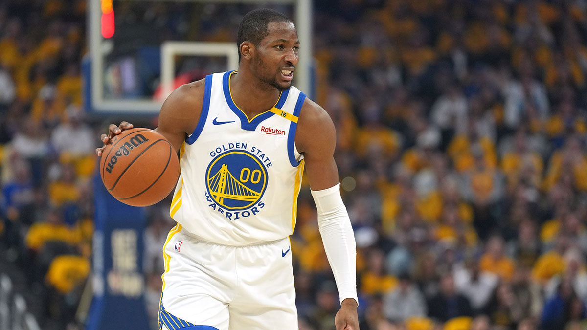 Golden State Warriors forward Jonathan Kuminga (00) dribbles against the Houston Rockets during the first quarter of game three of first round for the 2024 NBA Playoffs at Chase Center.