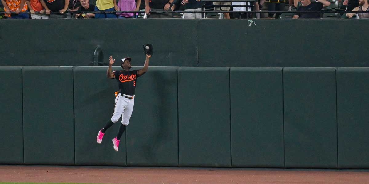 Aug 8, 2023; Baltimore, Maryland, USA; Baltimore Orioles centerfielder Jorge Mateo (3) leaps to catch a Houston Astros left fielder Yordan Alvarez (44) fifth inning fly ball at Oriole Park at Camden Yards. Mandatory Credit: Tommy Gilligan-Imagn Images