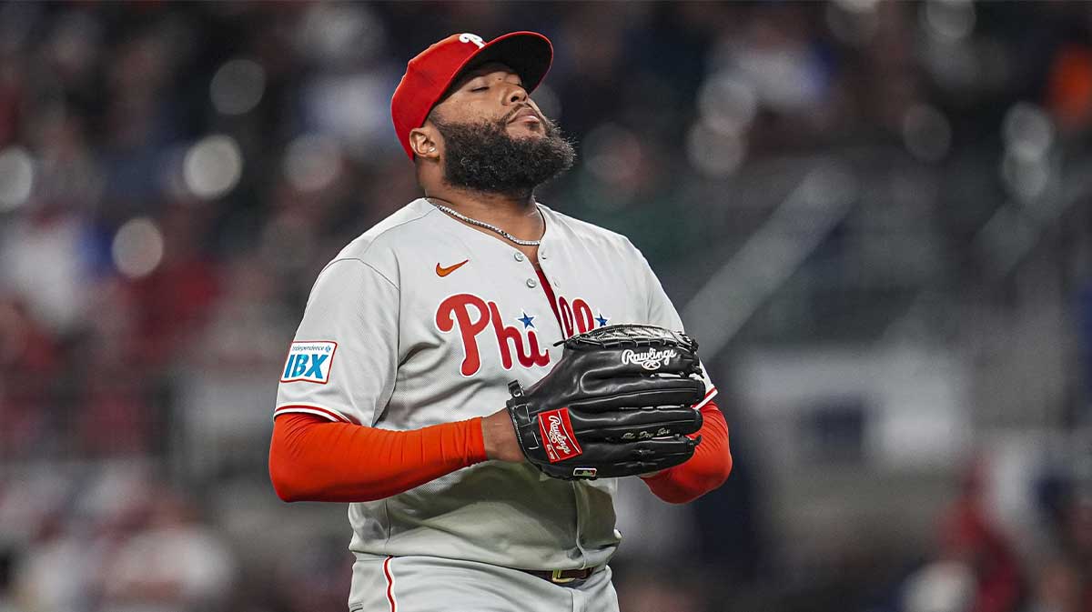Philadelphia Phillies pitcher Jose Alvarado (46) reacts after retiring the side against the Atlanta Braves during the eighth inning at Truist Park.