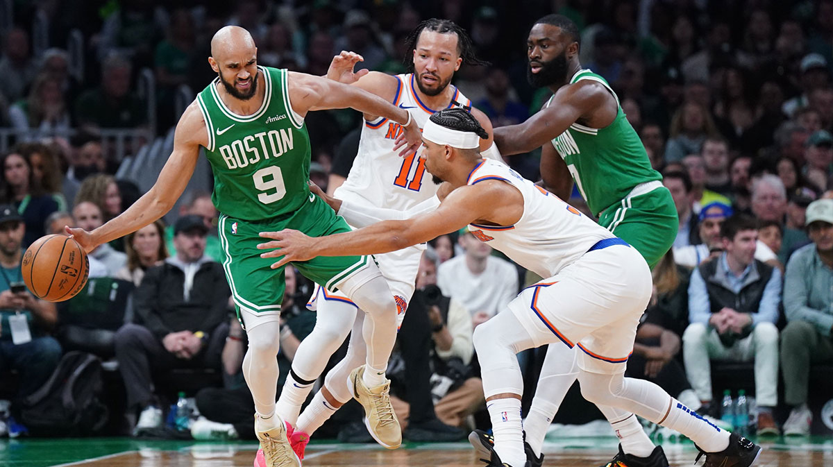 Boston Celtics guard Derrick White (9) works the ball against New York Knicks guard Josh Hart (3) in the first quarter during game two of the second round for the 2025 NBA Playoffs at TD Garden