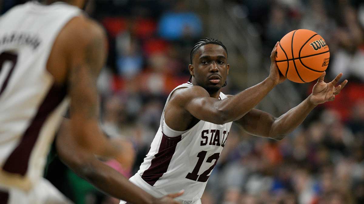 Mississippi State Bulldogs guard Josh Hubbard (12) passes the ball against the Baylor Bears during the first half in the first round of the NCAA Tournament at Lenovo Center.
