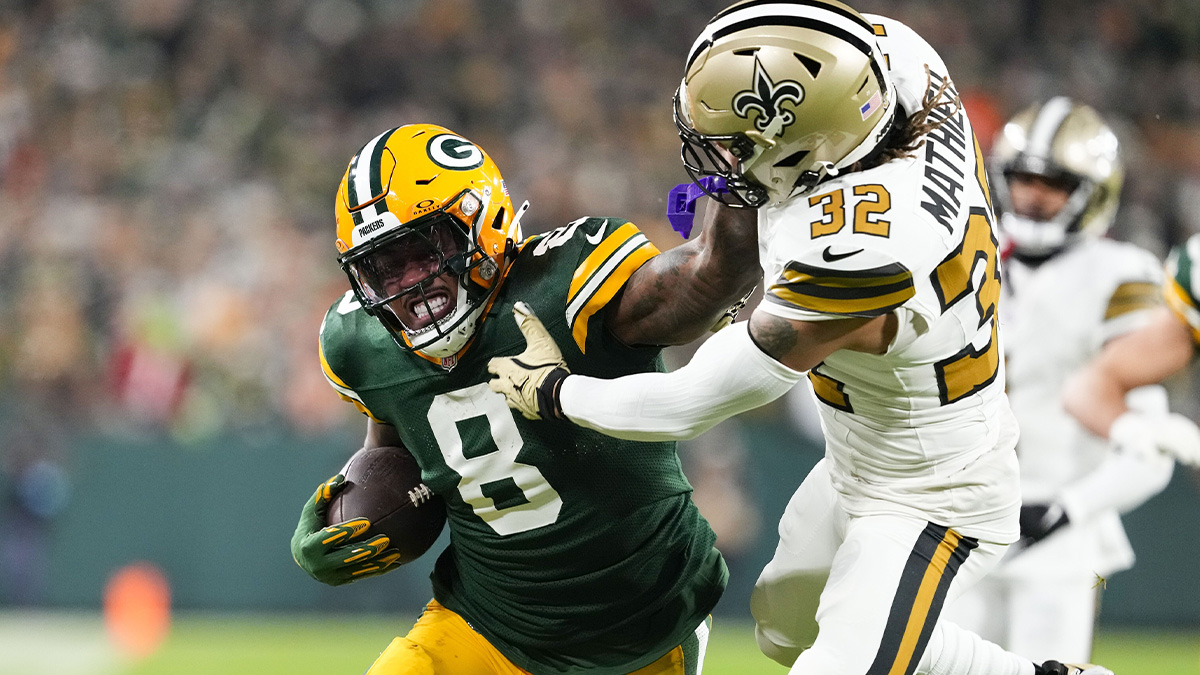 Jan 5, 2025; Green Bay, Wisconsin, USA; Green Bay Packers running back Josh Jacobs (8) celebrates after scoring a touchdown against the Chicago Bears on Sunday, January 5, 2024 at Lambeau Field. at Lambeau Field. 