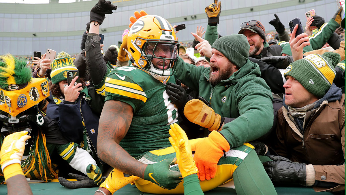 Jan 5, 2025; Green Bay, Wisconsin, USA; Green Bay Packers running back Josh Jacobs (8) celebrates after scoring a touchdown against the Chicago Bears on Sunday, January 5, 2024 at Lambeau Field. at Lambeau Field. Mandatory Credit: William Glasheen USA TODAY NETWORK-Wisconsin