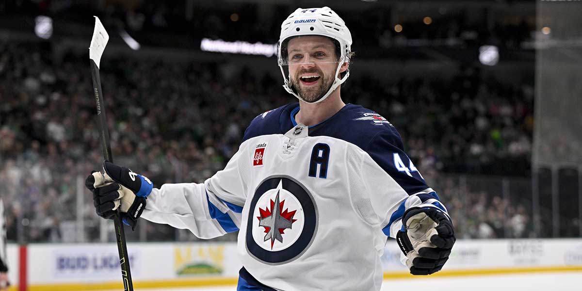 Winnipeg Jets defenseman Josh Morrissey (44) celebrates a goal scored by right wing Nino Niederreiter (not pictured) against the Dallas Stars during the first period at the American Airlines Center