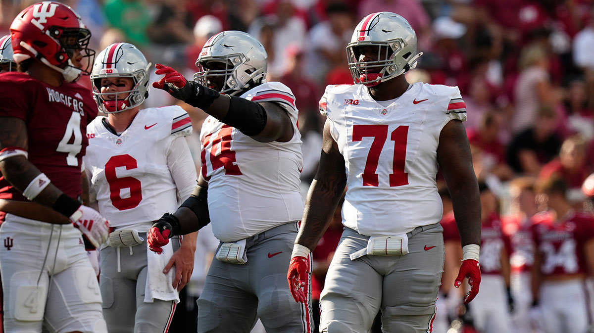 Ohio State Buckeyes offensive lineman Josh Simmons (71) lines up beside offensive lineman Donovan Jackson (74) during the NCAA football game at Indiana University Memorial Stadium. Ohio State won 23-3.