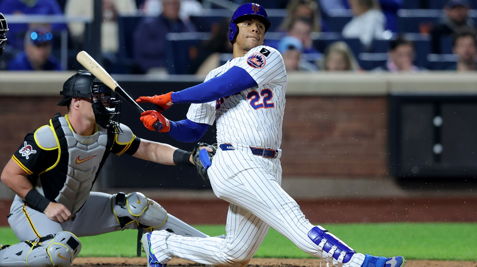 May 12, 2025; New York City, New York, USA; New York Mets right fielder Juan Soto (22) follows through on an RBI groundout during the seventh inning against the Pittsburgh Pirates at Citi Field.