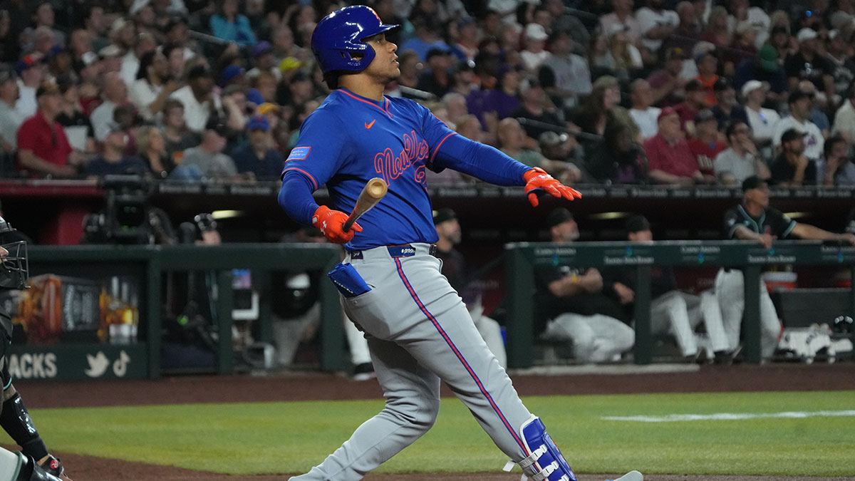 New York Mets outfielder Juan Soto (22) hits a solo home run against the Arizona Diamondbacks in the sixth inning at Chase Field.