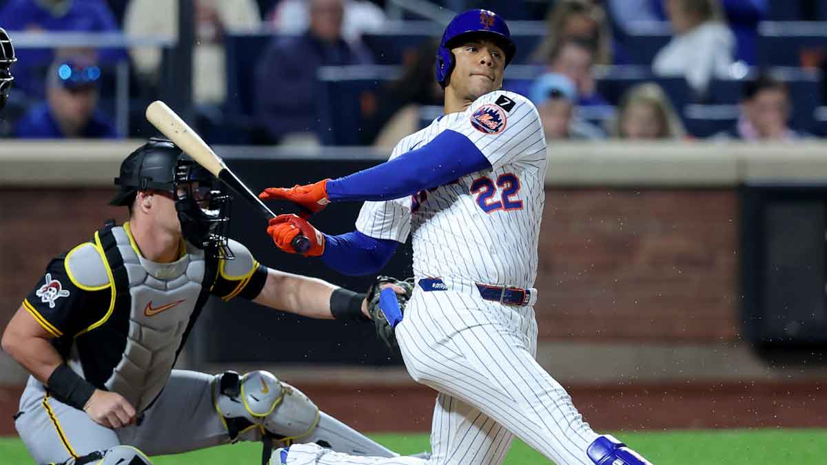 May 12, 2025; New York City, New York, USA; New York Mets right fielder Juan Soto (22) follows through on an RBI groundout during the seventh inning against the Pittsburgh Pirates at Citi Field.
