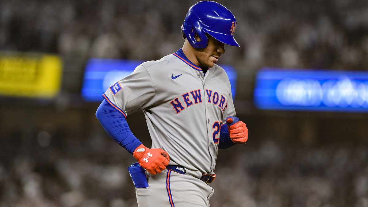 New York Mets outfielder Juan Soto (22) reacts after grounding out against the New York Yankees during the seventh inning at Yankee Stadium.