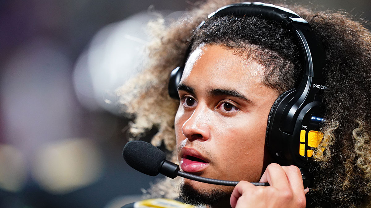 Carrollton Trojans quarterback Julian Lewis (10) watches on from the sidelines against the Westlake Lions during the first half at Grisham Stadium.
