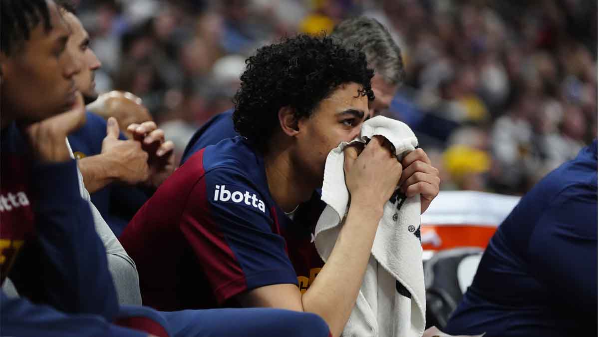 Denver Nuggets guard Julian Strawther (3) reacts from the bench in the fourth quarter against the Indiana Pacers at Ball Arena.