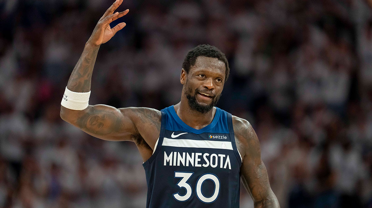 Minnesota Timberwolves forward Julius Randle (30) raises his arm to pump up the crowd after making a shot against the Golden State Warriors in the first half during game five of the second round for the 2025 NBA Playoffs at Target Center.