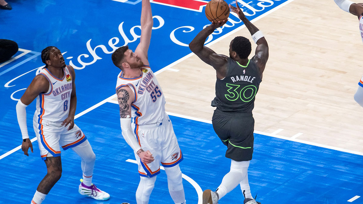 Minnesota Timberwolves forward Julius Randle (30) shoots against Oklahoma City Thunder center Isaiah Hartenstein (55) in the first quarter during game one of the western conference finals for the 2025 NBA Playoffs at Paycom Center.
