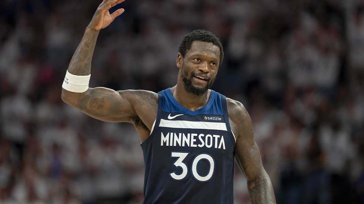 Minnesota Timberwolves forward Julius Randle (30) raises his arm to pump up the crowd after making a shot against the Golden State Warriors in the first half during game five of the second round for the 2025 NBA Playoffs at Target Center.