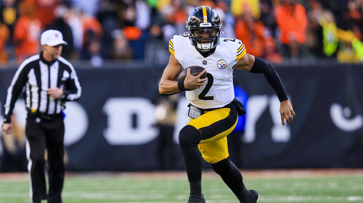Dec 1, 2024; Cincinnati, Ohio, USA; Pittsburgh Steelers quarterback Justin Fields (2) runs with the ball against the Cincinnati Bengals in the second half at Paycor Stadium.
