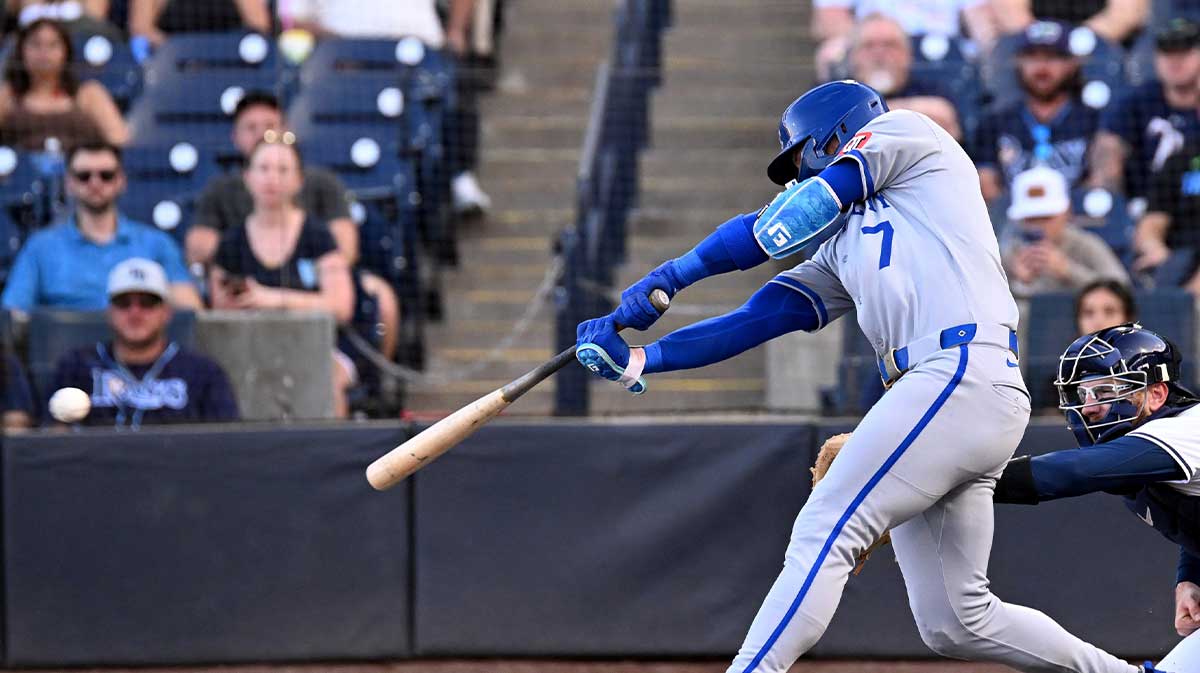 Kansas City Royals shortstop Bobby Witt Jr. (7) hits a single in the first inning against the Tampa Bay Rays at George M. Steinbrenner Field.