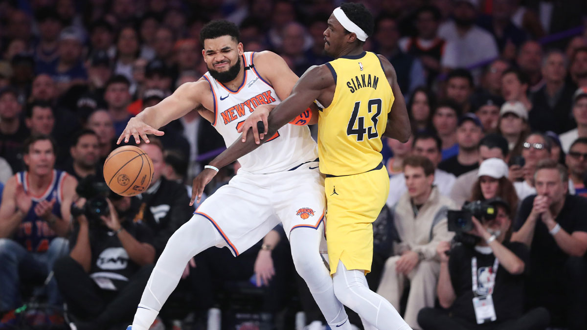 May 23, 2025; New York, New York, USA; New York Knicks center Karl-Anthony Towns (32) controls the ball against Indiana Pacers forward Pascal Siakam (43) in the second quarter during game two of the eastern conference finals for the 2025 NBA Playoffs at Madison Square Garden. Mandatory Credit: Wendell Cruz-Imagn Images