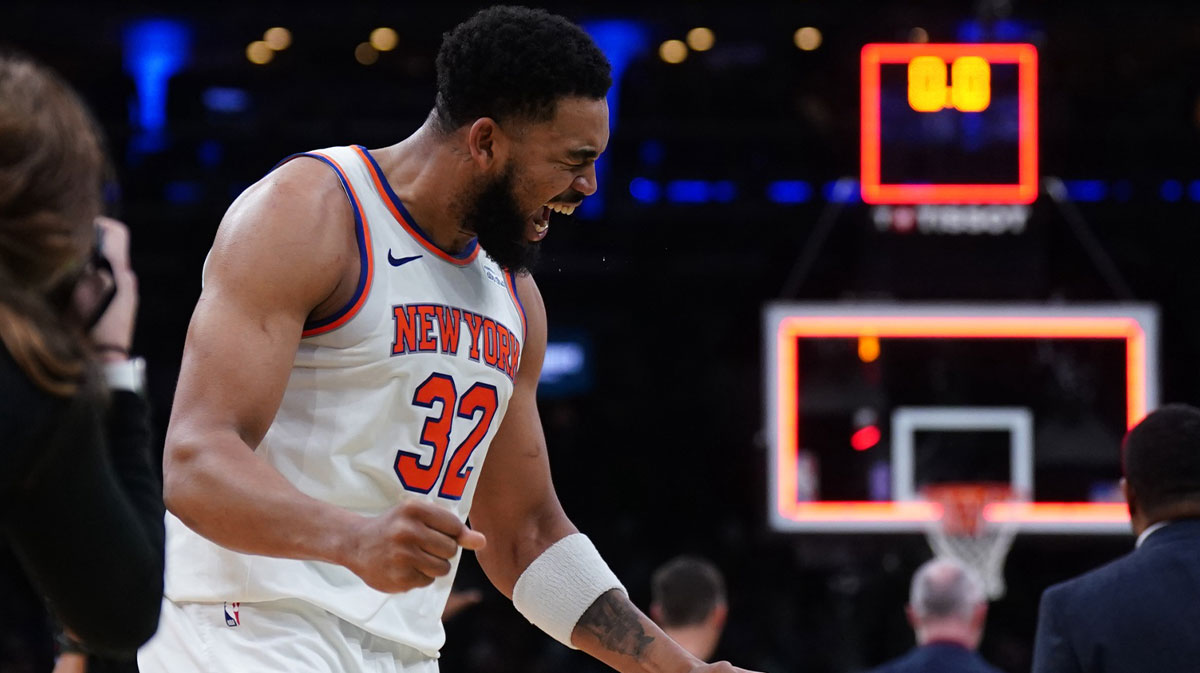 New York Knicks center Karl-Anthony Towns (32) reacts after defeating the Boston Celtics in game two of the second round for the 2025 NBA Playoffs at TD Garden.