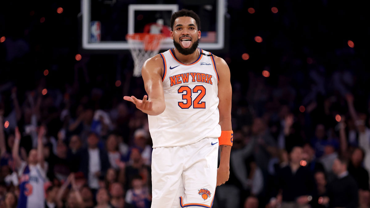 New York Knicks center Karl-Anthony Towns (32) celebrates his three point shot against the Boston Celtics during the first quarter of game six in the second round of the 2025 NBA Playoffs at Madison Square Garden.