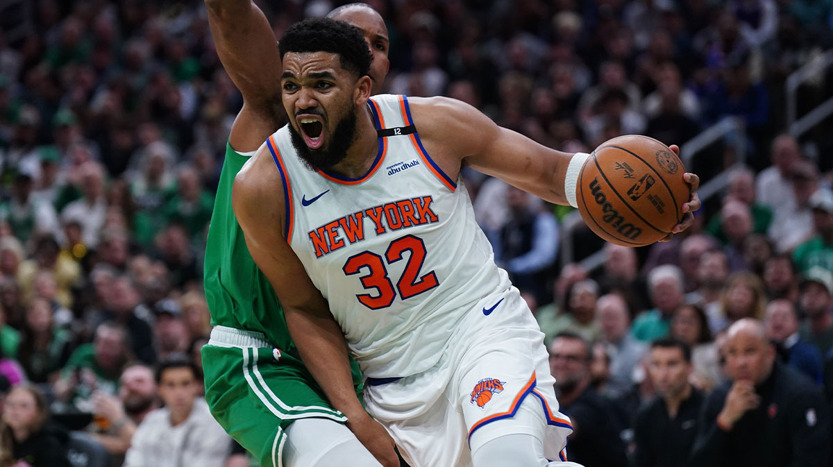 New York Knicks center Karl-Anthony Towns (32) drives the ball against Boston Celtics center Al Horford (42) in the second quarter during game two of the second round for the 2025 NBA Playoffs at TD Garden.