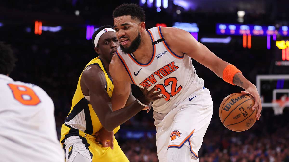 New York Knicks center Karl-Anthony Towns (32) controls the ball against Indiana Pacers forward Pascal Siakam (43) in the third quarter during game one of the eastern conference finals for the 2025 NBA Playoffs at Madison Square Garden.