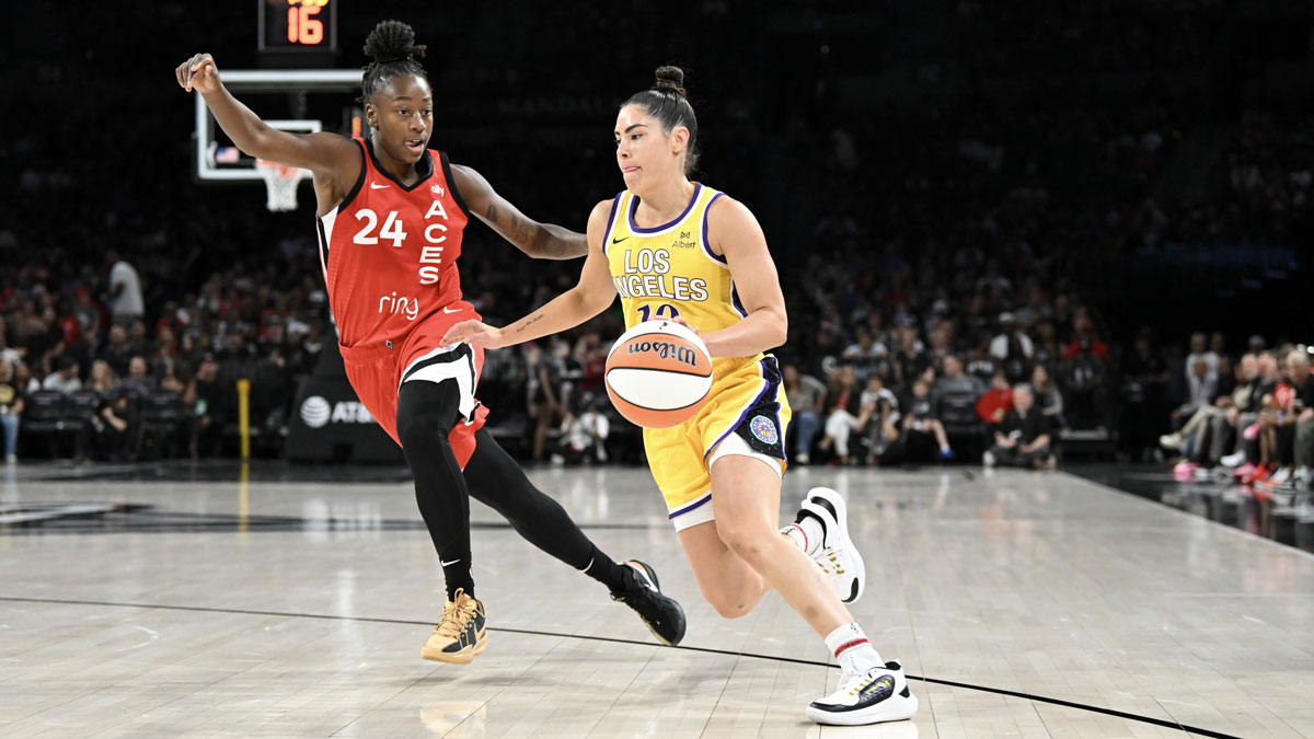 Los Angeles Sparks guard Kelsey Plum (10) drives past Las Vegas Aces guard Jewell Loyd (24) in the third quarter of their game at Michelob Ultra Arena.