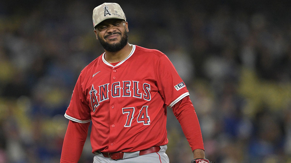 Los Angeles Angels relief pitcher Kenley Jansen (74) reacts after missing a pitch in the ninth inning against the Los Angeles Dodgers at Dodger Stadium.