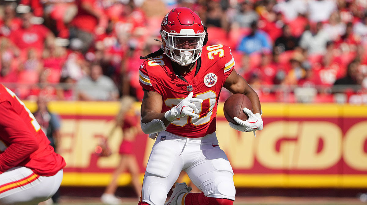 Kansas City Chiefs running back Keaontay Ingram (30) runs the ball against the Detroit Lions during the first half.