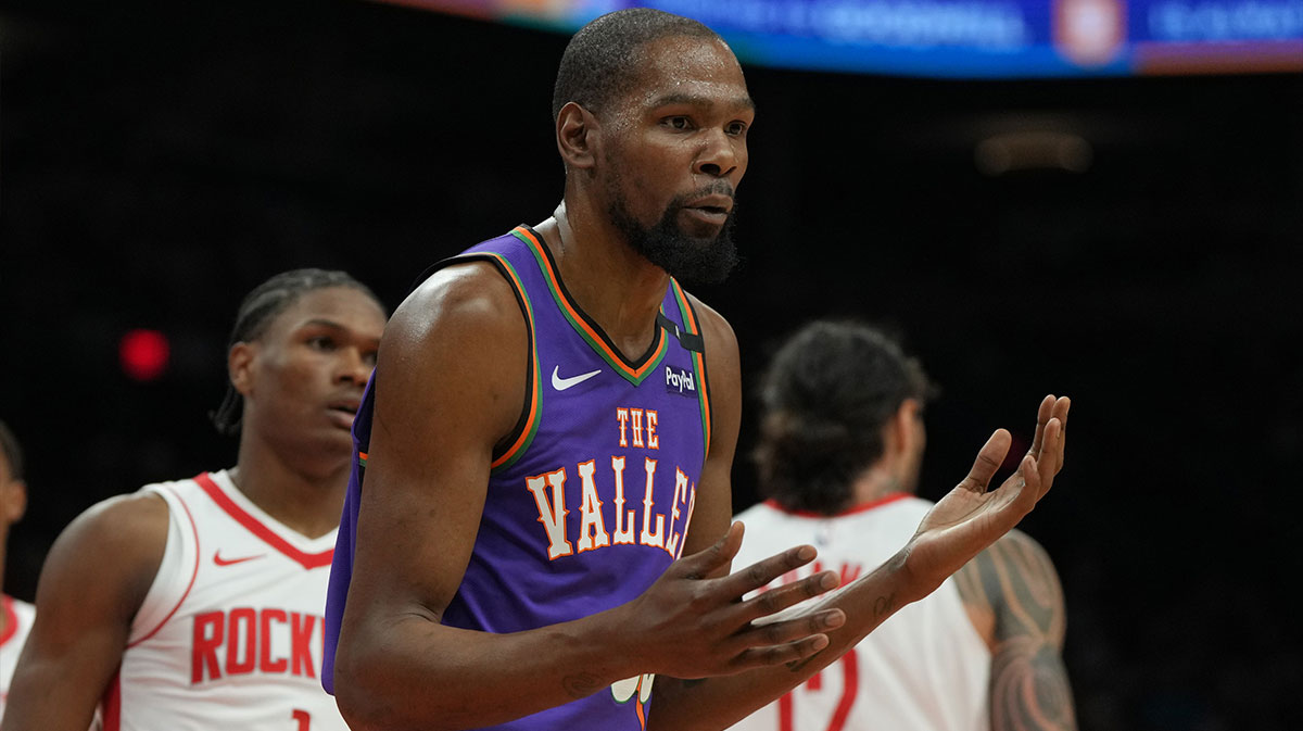 Phoenix Suns forward Kevin Durant (35) reacts after fouling a Houston Rockets player in the first half at Footprint Center.