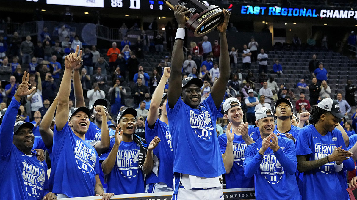 Duke Blue Devils center Khaman Maluach (9) raise the East Region trophy after beating the Alabama Crimson Tide in the East Regional final of the 2025 NCAA tournament at Prudential Center.
