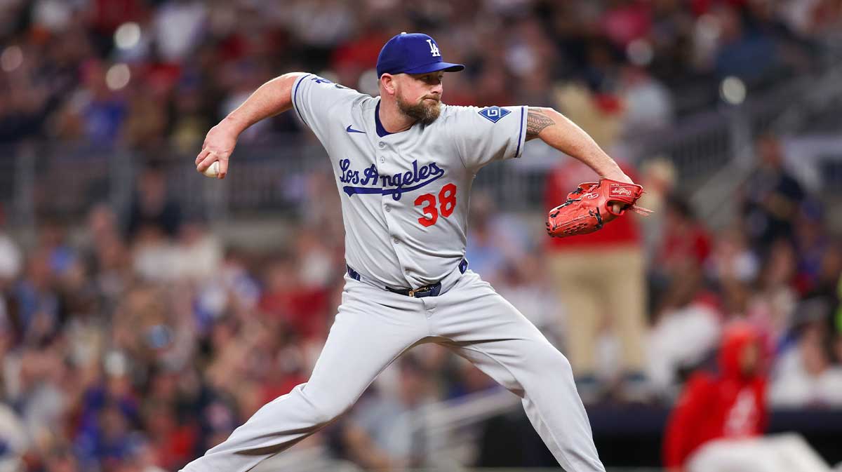 May 2, 2025; Atlanta, Georgia, USA; Los Angeles Dodgers relief pitcher Kirby Yates (38) throws against the Atlanta Braves in the seventh inning at Truist Park.
