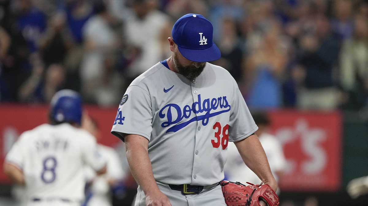 Apr 19, 2025; Arlington, Texas, USA; Los Angeles Dodgers relief pitcher Kirby Yates (38) walks to the dugout after giving up the game winning home run to Texas Rangers right fielder Ardolis Garcia (not shown) during the ninth inning at Globe Life Field. Mandatory Credit: Jim Cowsert-Imagn Images