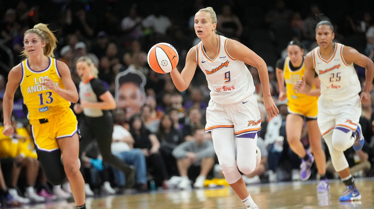 Phoenix Mercury guard Kitija Laksa (9) brings the ball up against the Los Angeles Sparks during the third quarter at PHX Arena in Phoenix, on May 21, 2025.